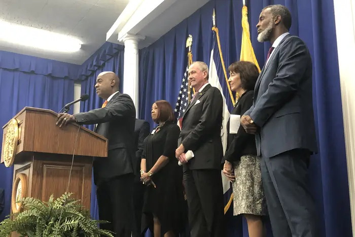 Officials at a press conference in Newark.